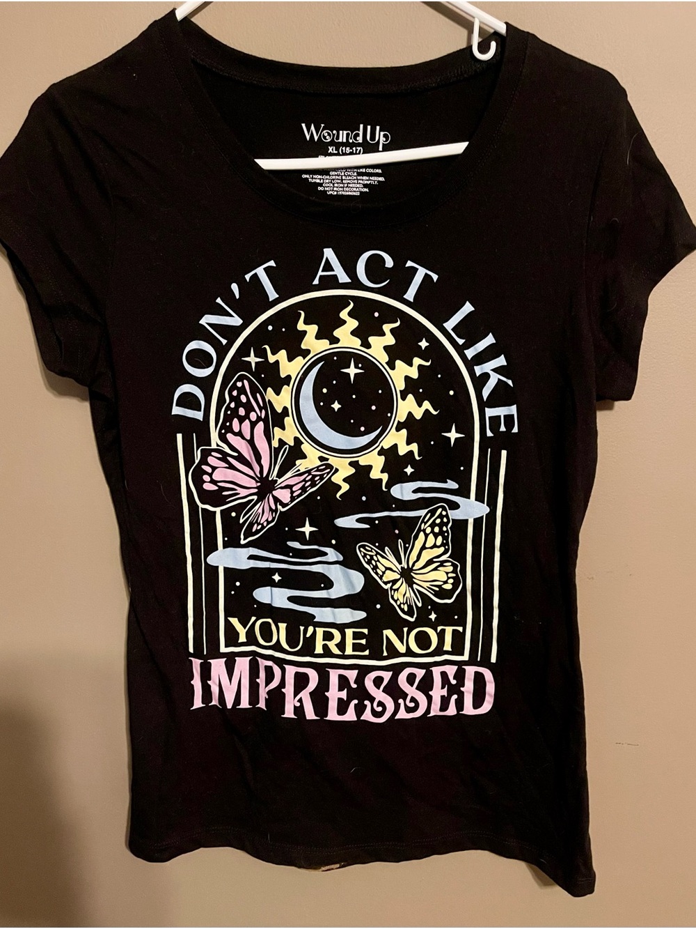 Wound Up Black Graphic Tee with Pastel Butterfly and Moon Print